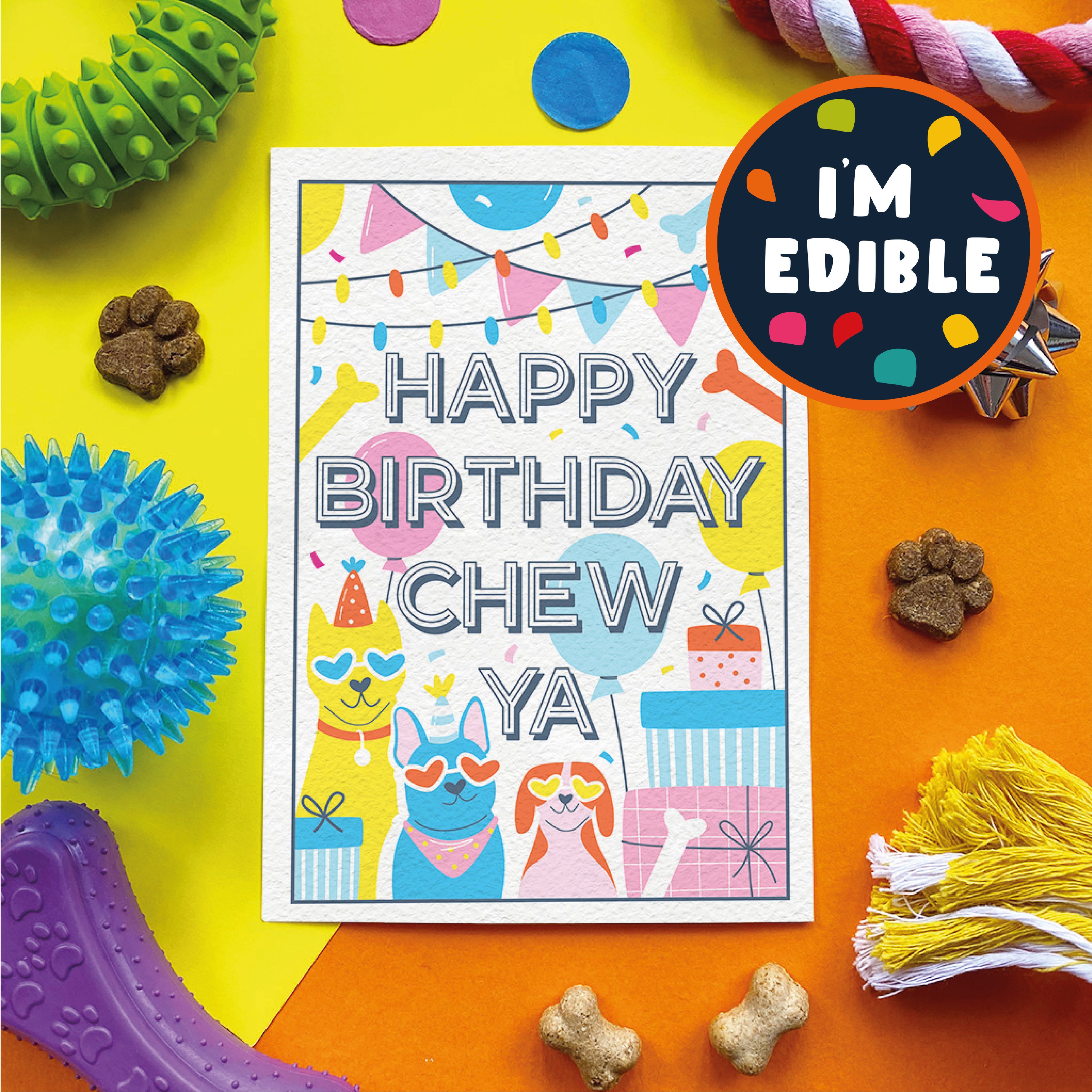 Birthday card with colorful text and illustrations surrounded by dog toys and treats on a multicolored background.